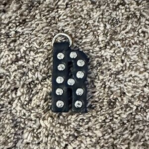 Consuela Black Studded  R Keychain Charm